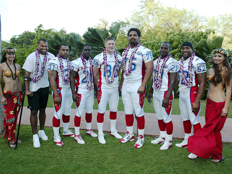Tennessee Titans Craig Hentrich, Brad Hopkins, Steve McNair, Derrick Mason, and Keith Bulluck at the 2004 NFL Pro Bowl, where the NFC rallied from 25 points behind to win the game by a record (total score) of 55 to 52 over the AFC at Aloha Stadium on 02/08/2004. ©Paul Spinelli/NFL Photos
